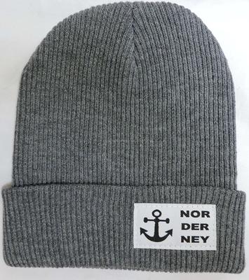 Kitted hat sewn with woven patch logo